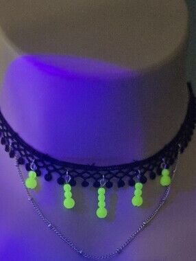Handmade black lace choker featuring glowing uranium glass beads